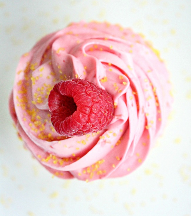 Two Lemon Cupcakes with Raspberry Buttercream Frosting- Big Green House #cupcake #lemon #baking #raspberry #buttercreamfrosting