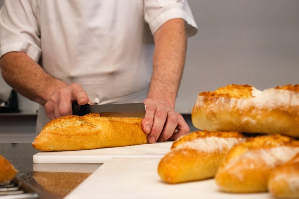 Man Slicing Bread