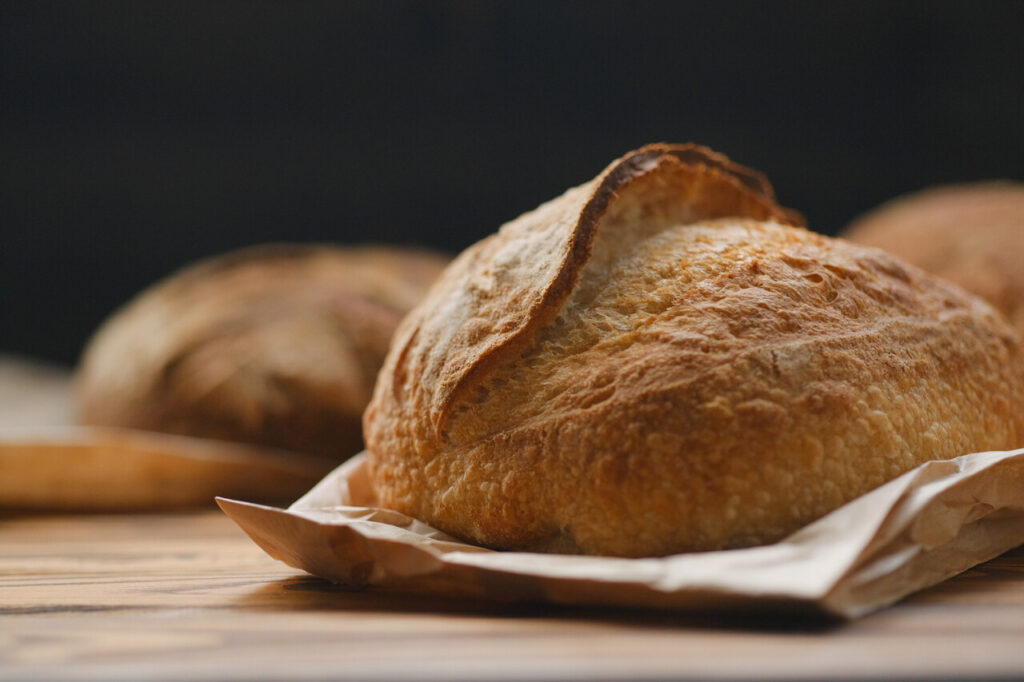 Bread on top of a paper bag