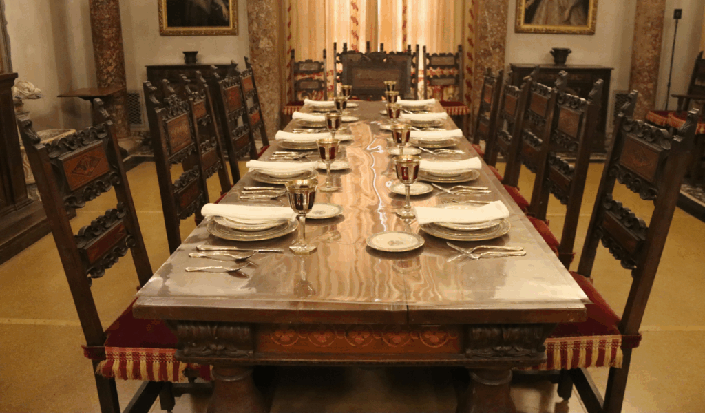 Wait until everyone is served (and the host begins)