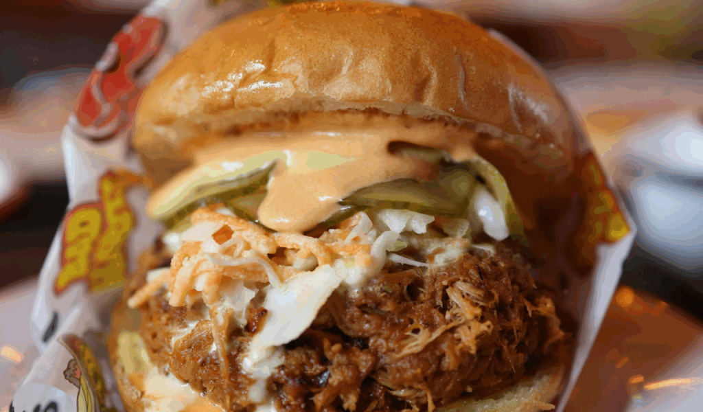 Skip: Pulled Pork Sandwich with White Bun | Order Instead: Pulled Pork Plate with Slaw