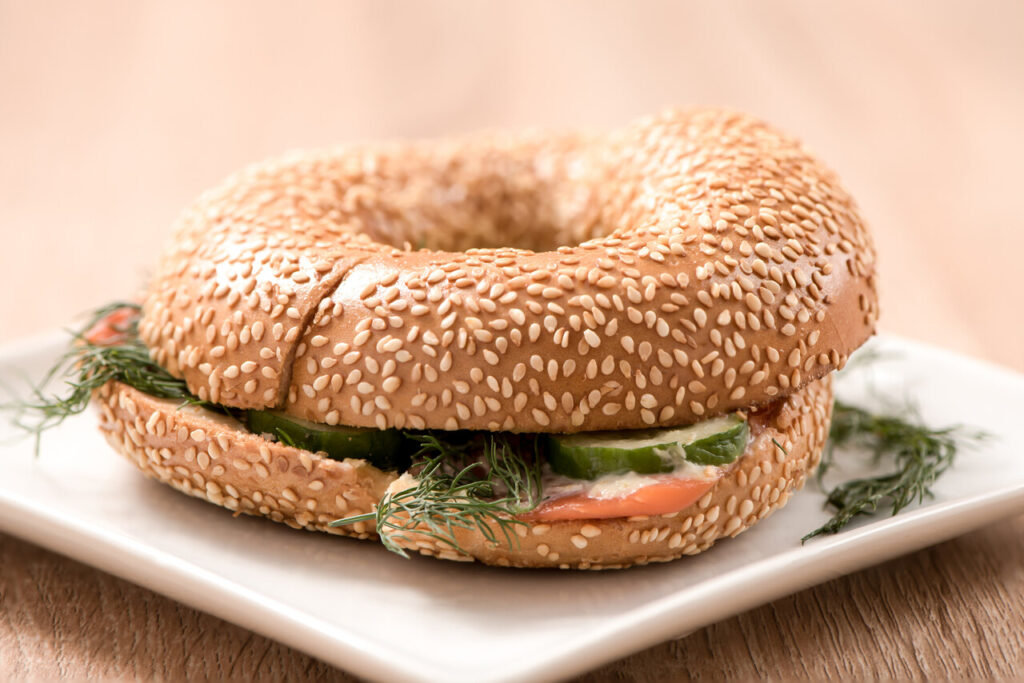 Mushroom, egg, and cheddar bagel sandwich