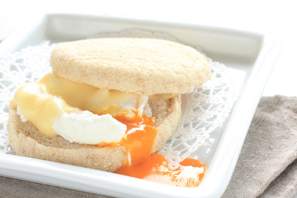 Make-ahead veggie and goat cheese omelet sandwich on an English muffin