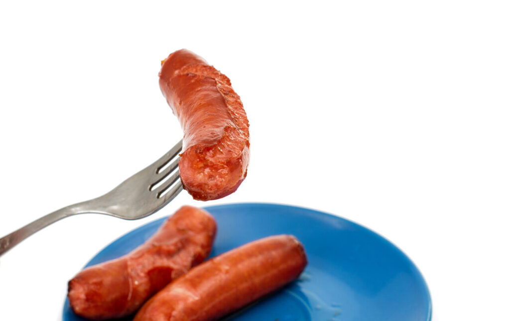fried sausage on a fork