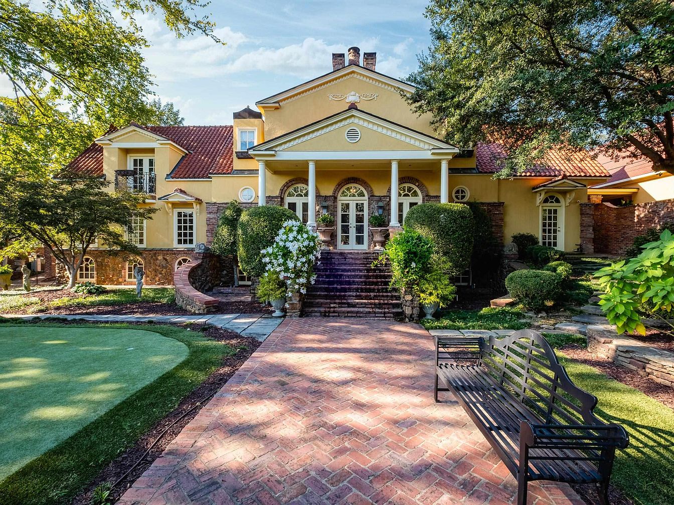 Rare 1920 Estate in Little Rock, Arkansas, With Exquisite Walnut Floors, Terraced Brick Gardens, and Four Historic Buildings