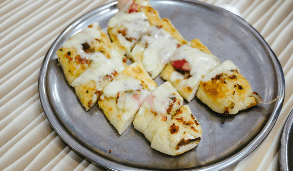 Cheesy Garlic Breadsticks with Herb Butter