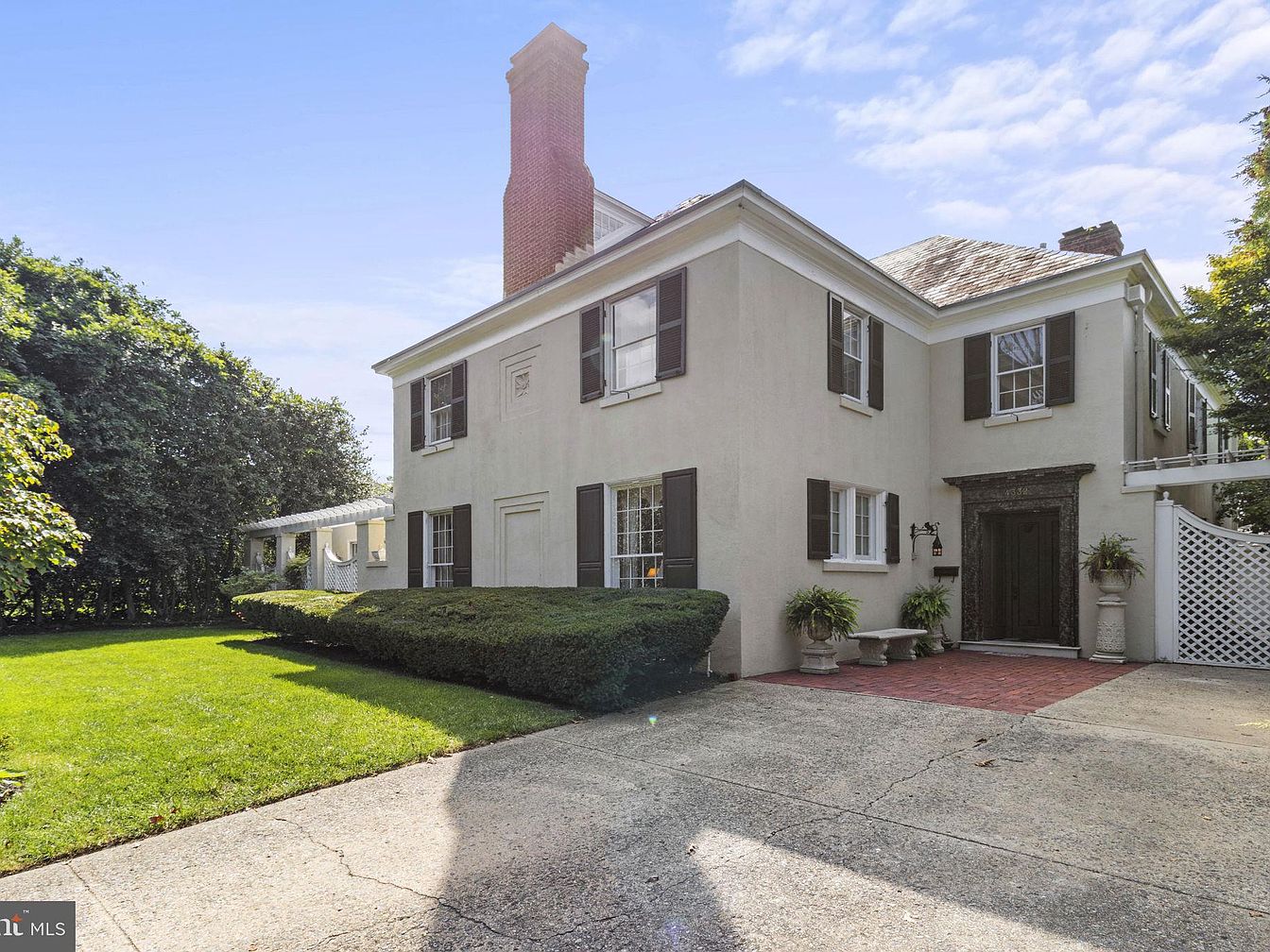 Stately 1915 Fowler Home in Baltimore, Maryland, With a Curved Staircase, a Paneled Walnut Library, and Sun-Filled Solarium