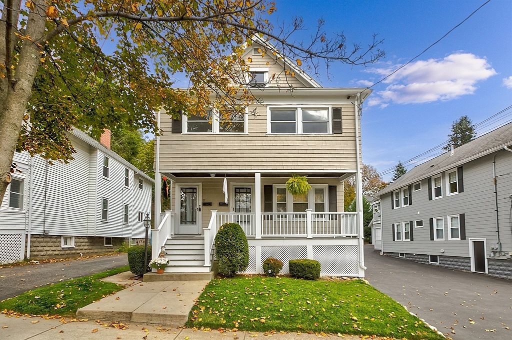 1926 Arlington, Massachusetts Two-Family Home Featuring Hardwood Floors, Renovated Kitchens, and a Landscaped Stone Patio