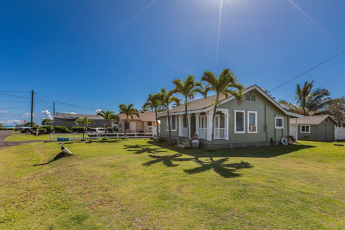 Experience a Classic 1930 Plantation Era Beach House in Kapaa, Hawaii—Featuring Original Built-Ins, French Doors, and Steps From Beloved Baby Beach
