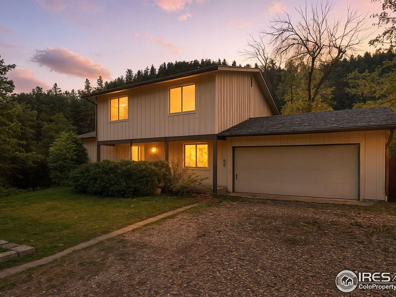 Experience the Magic of the 1968 Hummingbird House in Boulder, Colorado, With a Giant Stone Fireplace and Creekside Access