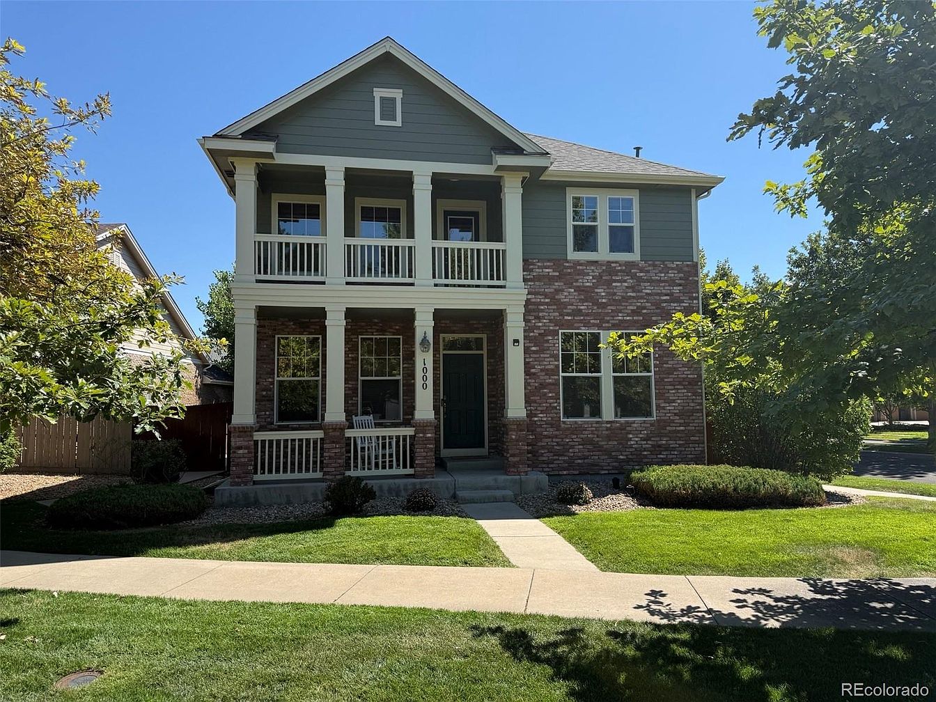 Visit This Denver Home, Colorado, Featuring Cherry Wood Floors, Two Primary Suites, and a Lowry Neighborhood Setting