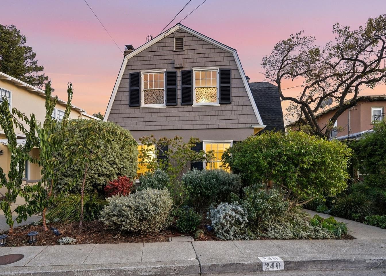 Visit 1930 Dutch Colonial in Piedmont, California, Featuring Hardwood Floors, Expansive Windows, and Sweeping Treetop Views