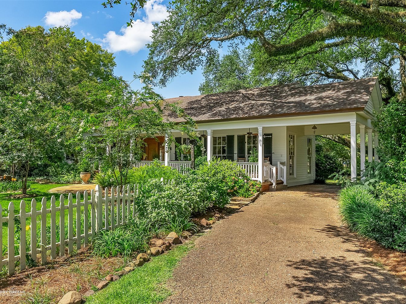 Amazing 1920 Louisiana Cypress Estate in Shreveport With Six Ancient Live Oaks, Private Ponds, and a Heated Lagoon Pool