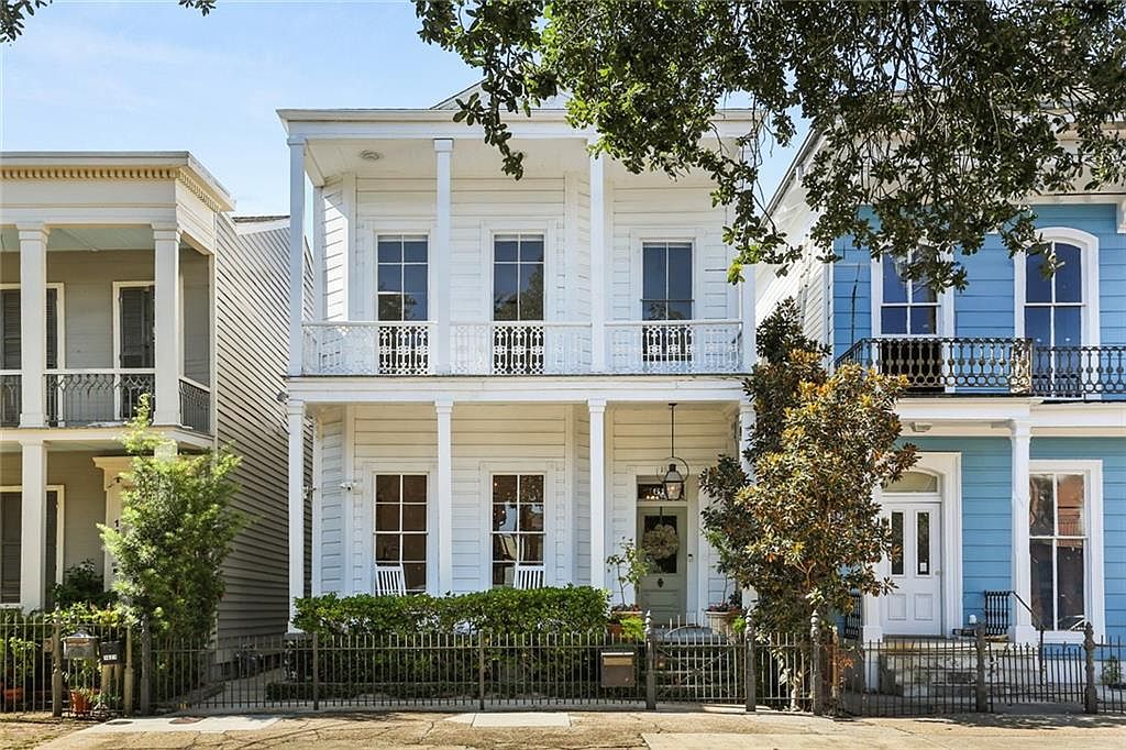 Storied 1917 Italianate Townhouse in New Orleans, Louisiana, With Triple Parlor Floor Plan, and a Lush Private Courtyard