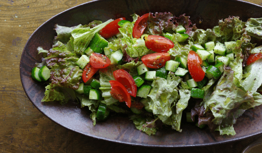Toss the salad gently for even coating