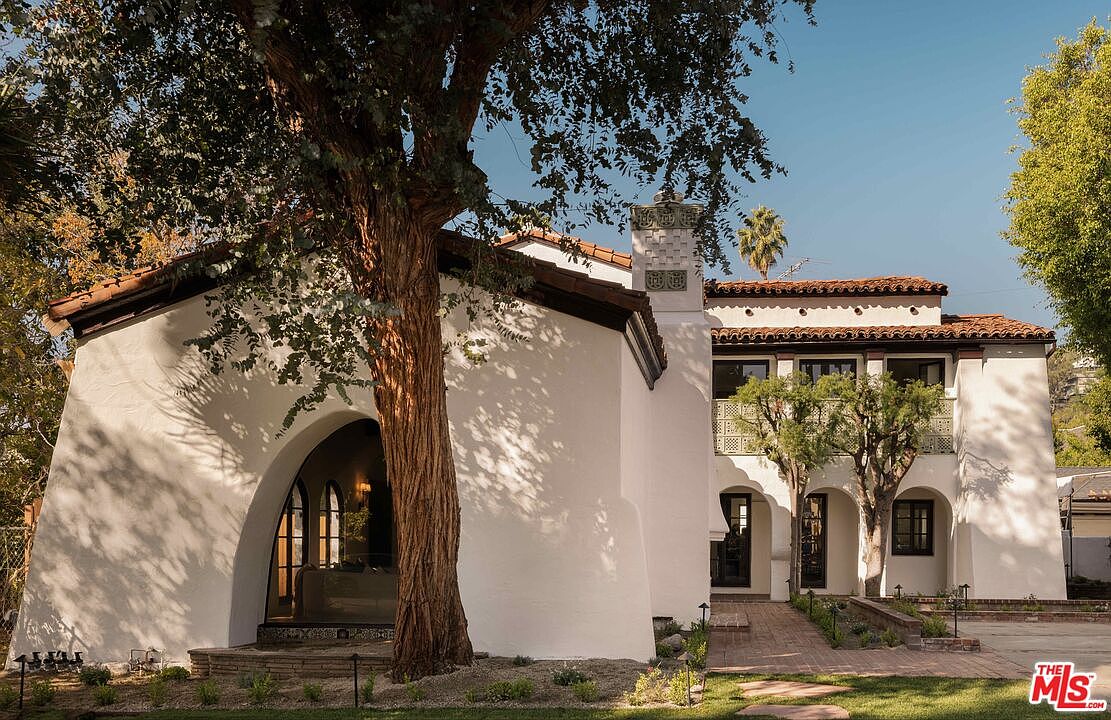 Stunning 1926 Spanish Revival in Los Angeles, California, With Saltillo Tile, Arched Doorways, and a Courtyard Pool
