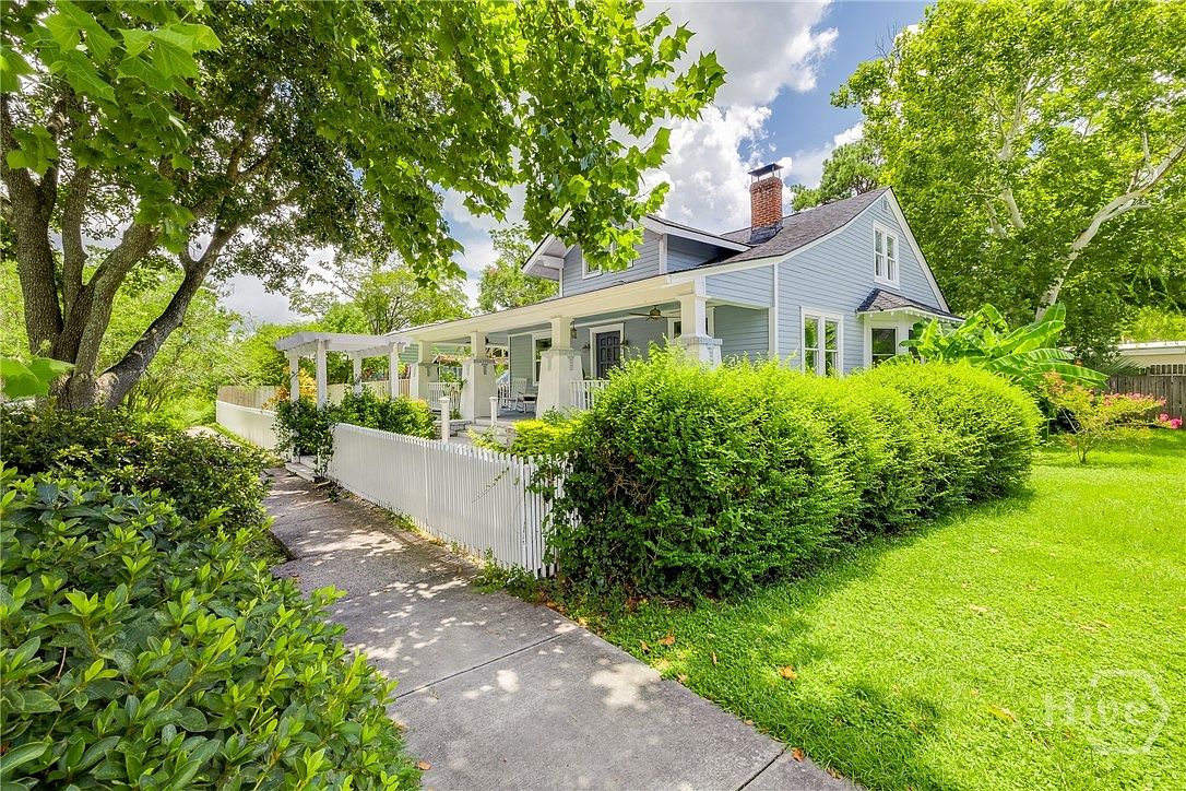Majestic 1921 Savannah Beauty in Georgia Featuring Heart Pine Floors, Custom Millwork, and a Sparkling In-Ground Pool