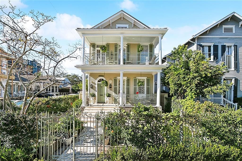 Step Into a Thoughtfully Restored 1910 New Orleans Home in Louisiana With Antique Marble Fireplaces, Custom Iron Garden Walls, and a Balcony Overlooking Historic Audubon Street