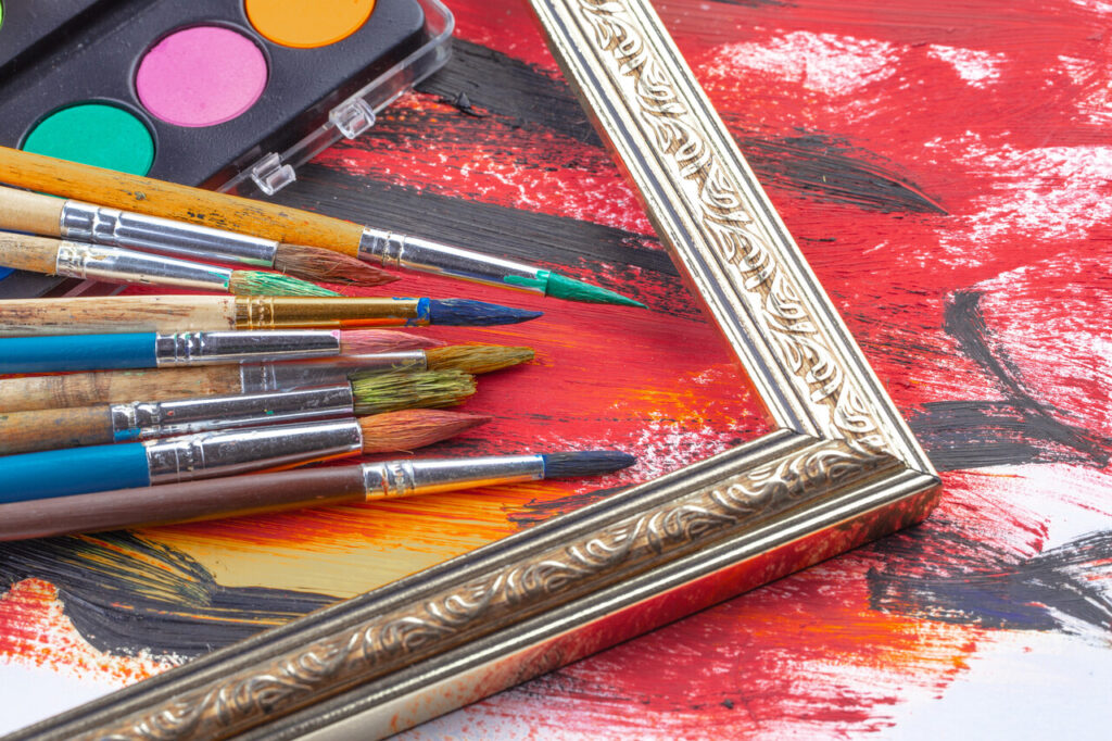 Add Metallic Texture Through Textiles, Art, Or Wallpaper