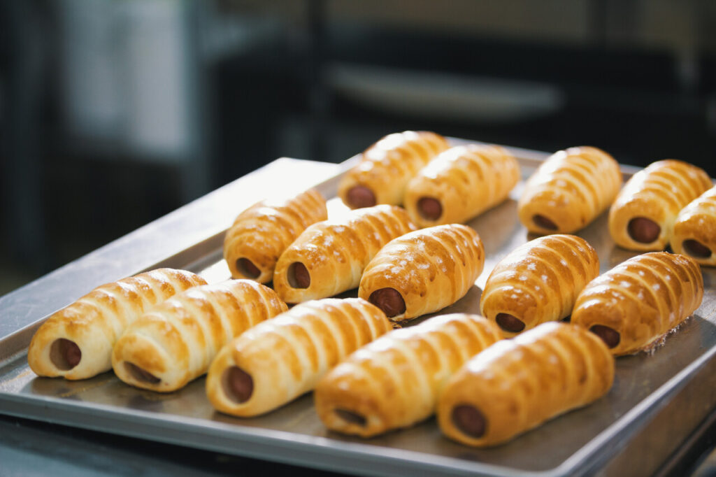 Sausage rolls made with puff pastry, apple, and sage filling