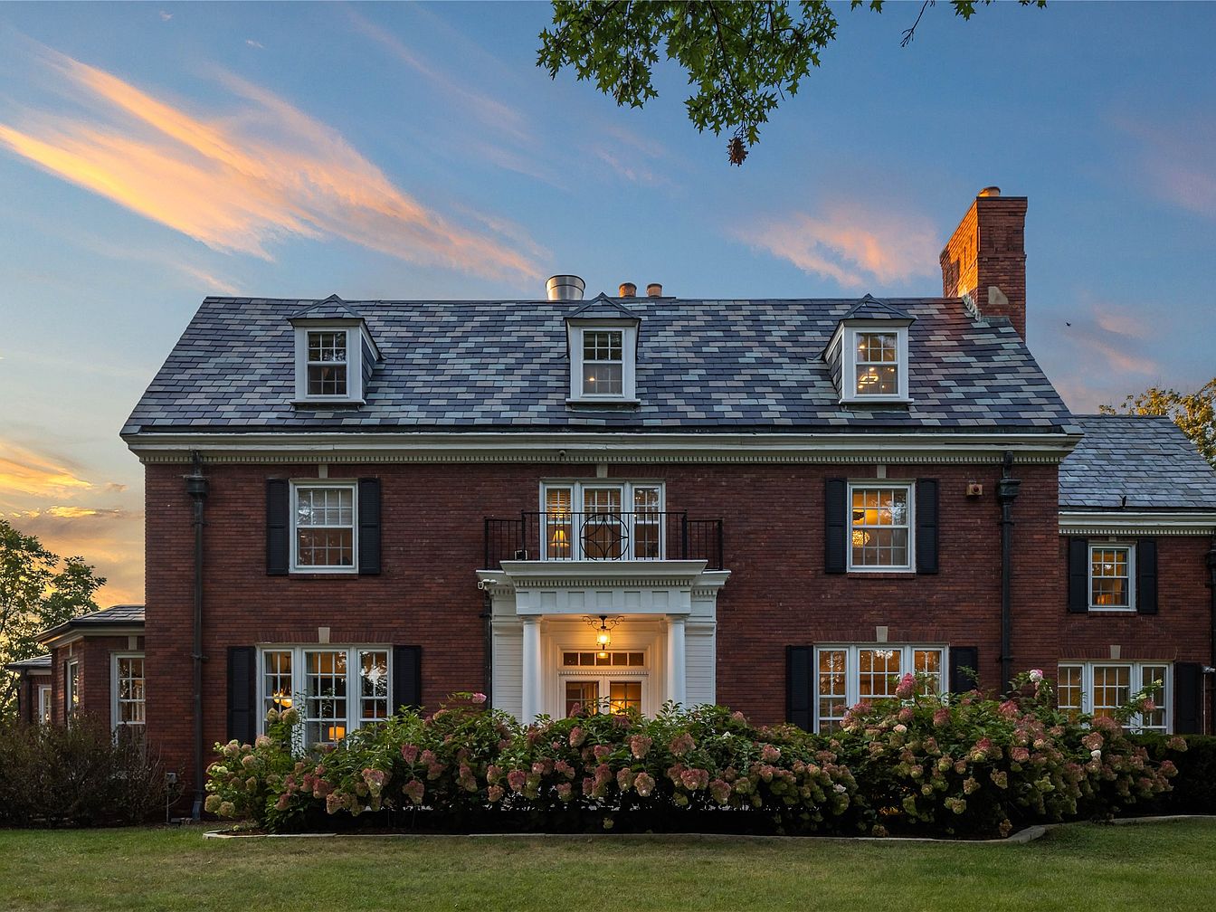 Grand 1928 Estate in Des Moines, Iowa Featuring 6 Fireplaces, a Walnut-Paneled Library, Resort-Style Pool, and Over 2 Acres