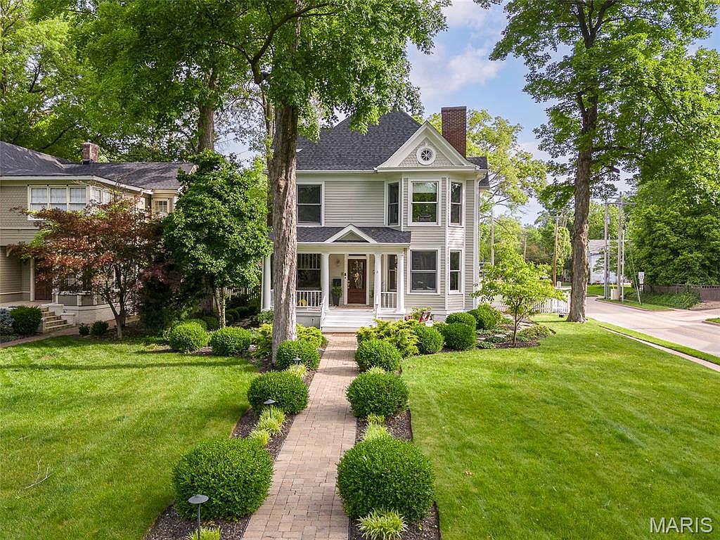 Stunning 1910 Victorian Masterpiece in Edwardsville, Illinois, with Original Features, Modern Amenities, and Outdoor Kitchen