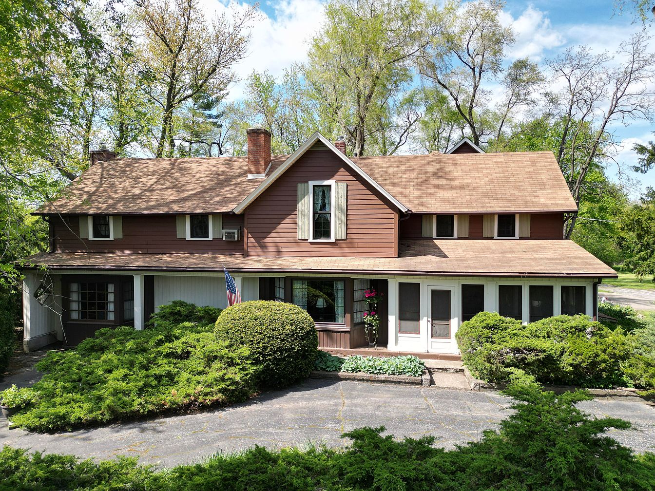Step Into a 1910 Country Estate in Winfield, Indiana, With 110 Acres, Four Fireplaces, a 40×60 Pole Barn, and a Huge Pond