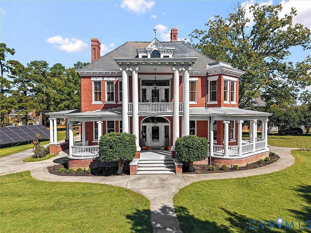 Historic 1910 Oliver Mansion in Crewe, Virginia Featuring 11-Foot Ceilings, Six Fireplaces, and a Wrap-Around Porch