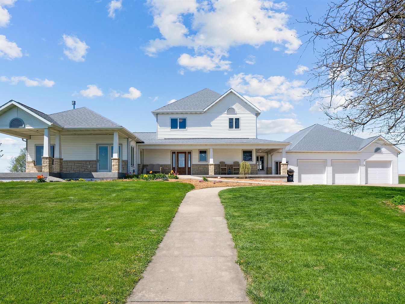 Explore 1930 Country Estate in Ossian, Iowa With 3-Acre Spring-Fed Pond, Island Gazebo, and Award-Winning Rural Charm