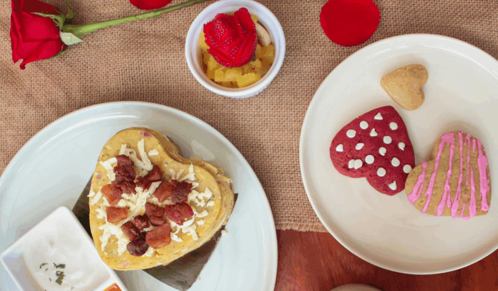 Heart shaped pancakes topped with syrup