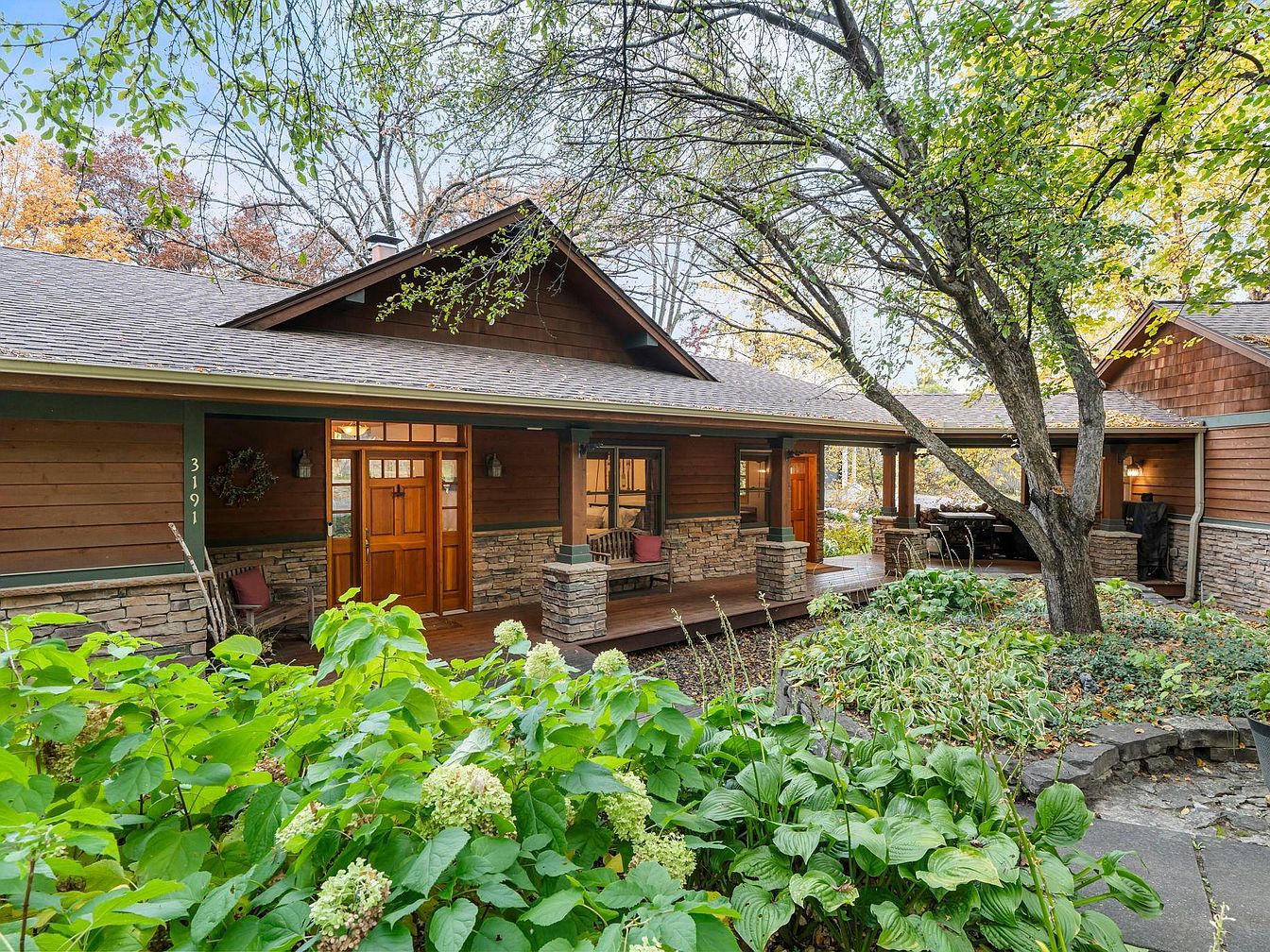 Spectacular 1923 Lakefront Retreat in Arden Hills, Minnesota With Panoramic Lake Josephine Views and Striking Stone Fireplace
