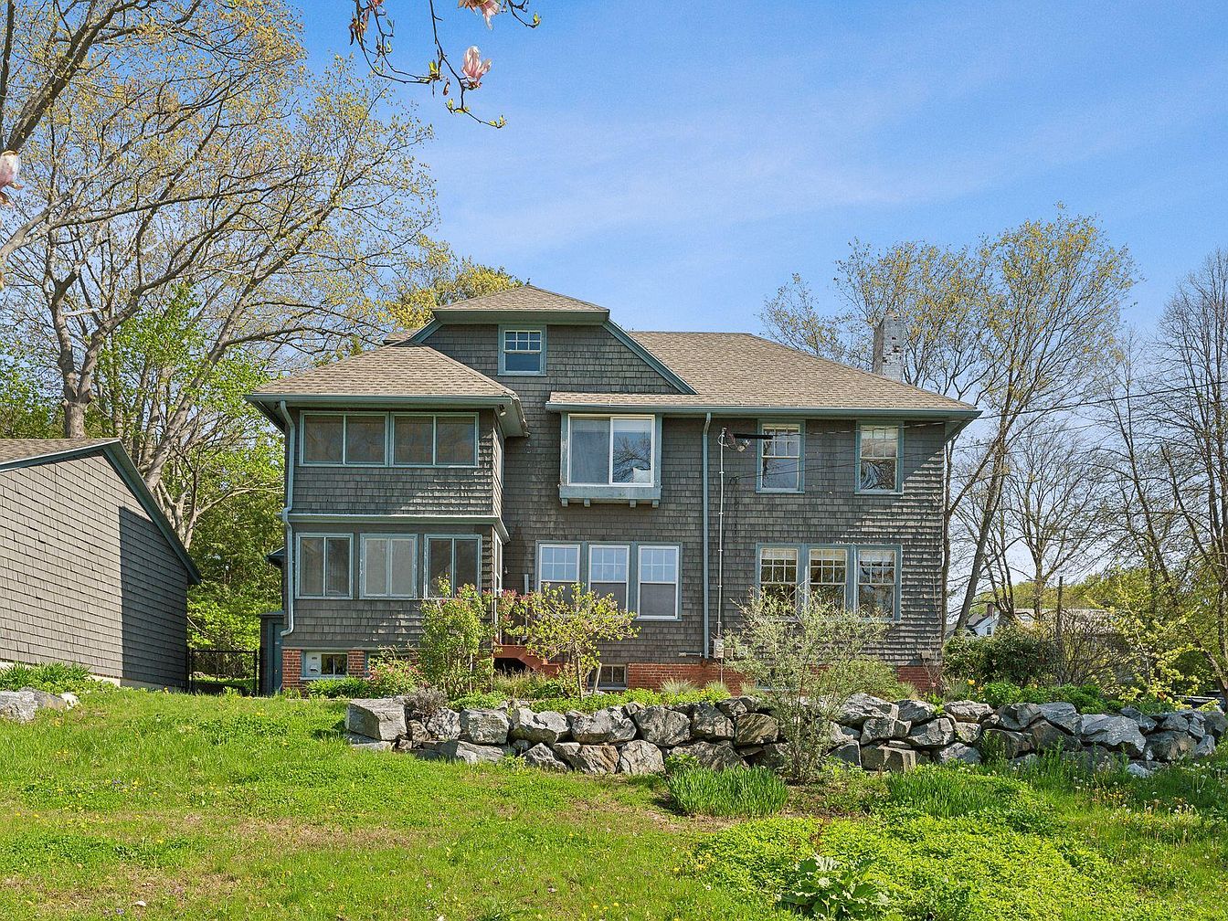 Discover a 1921 Gem in Portland, Maine, Featuring Original Architectural, a Spacious Primary Suite, and Outdoor Privacy