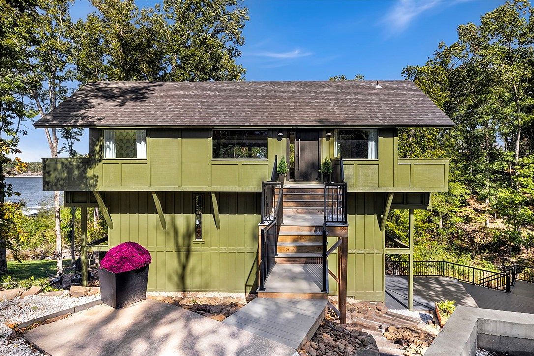 Stunning 1968 Lakefront Retreat in Rogers, Arkansas, With Expansive Windows, Two Private Boat Slips, and Beaver Lake Views
