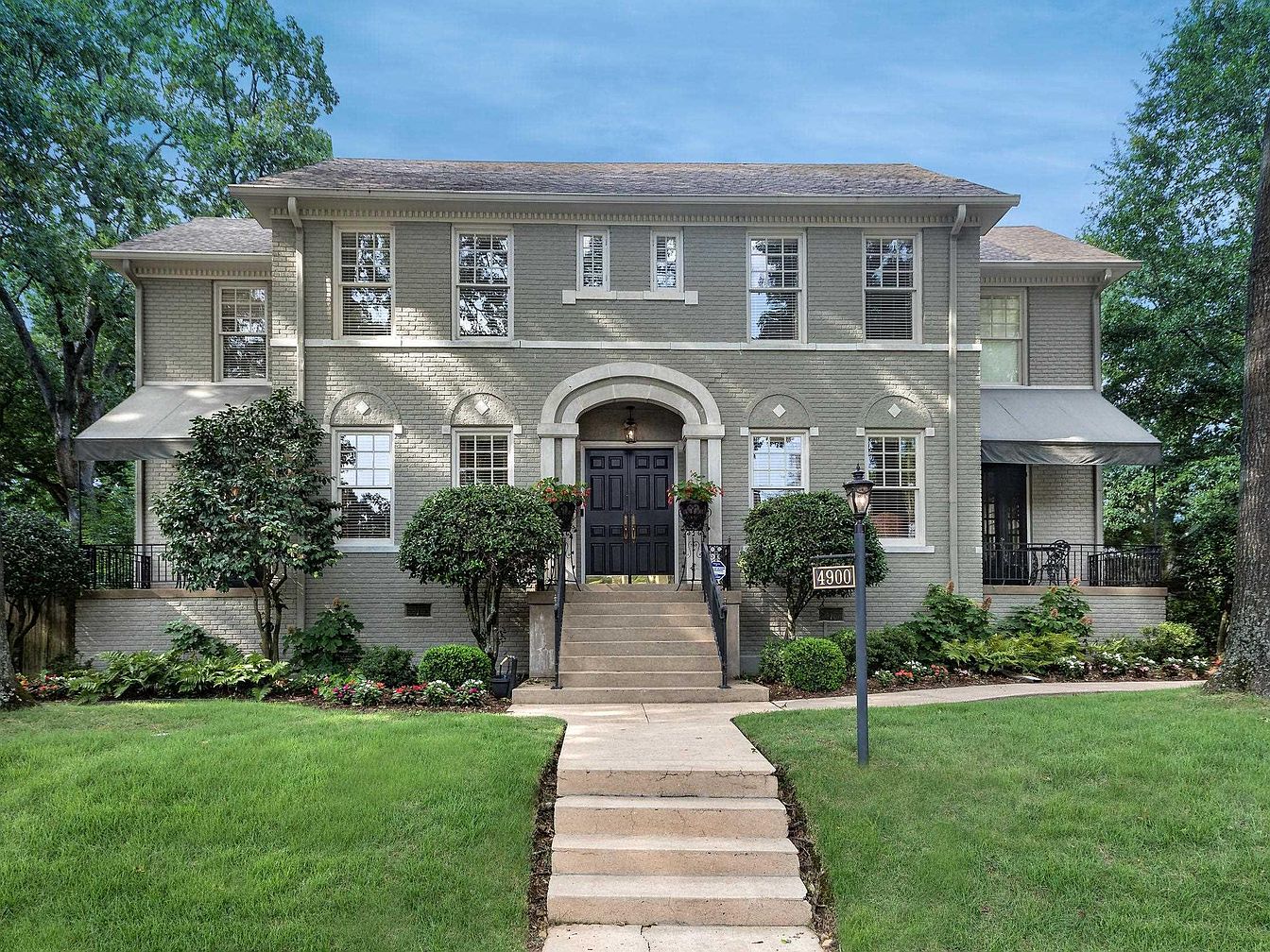 Stately 1930 Colonial Revival in Little Rock, Arkansas, with Three Fireplaces, Marble Counters, and a Guest House