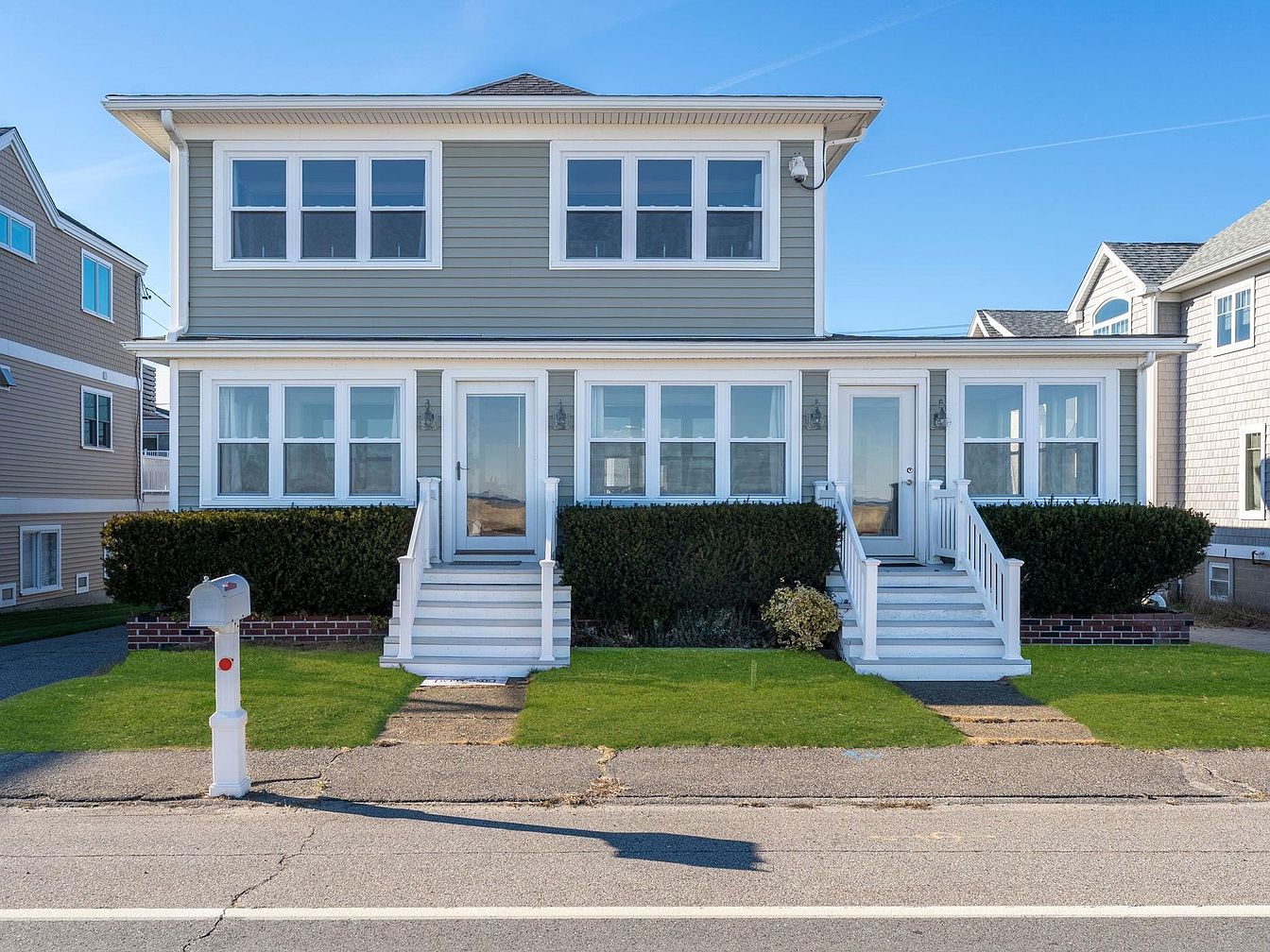 Charming 1925 Home in Hampton, New Hampshire with Ocean Views, a Gas Fireplace, and a Profitable Income-Generating Apartment