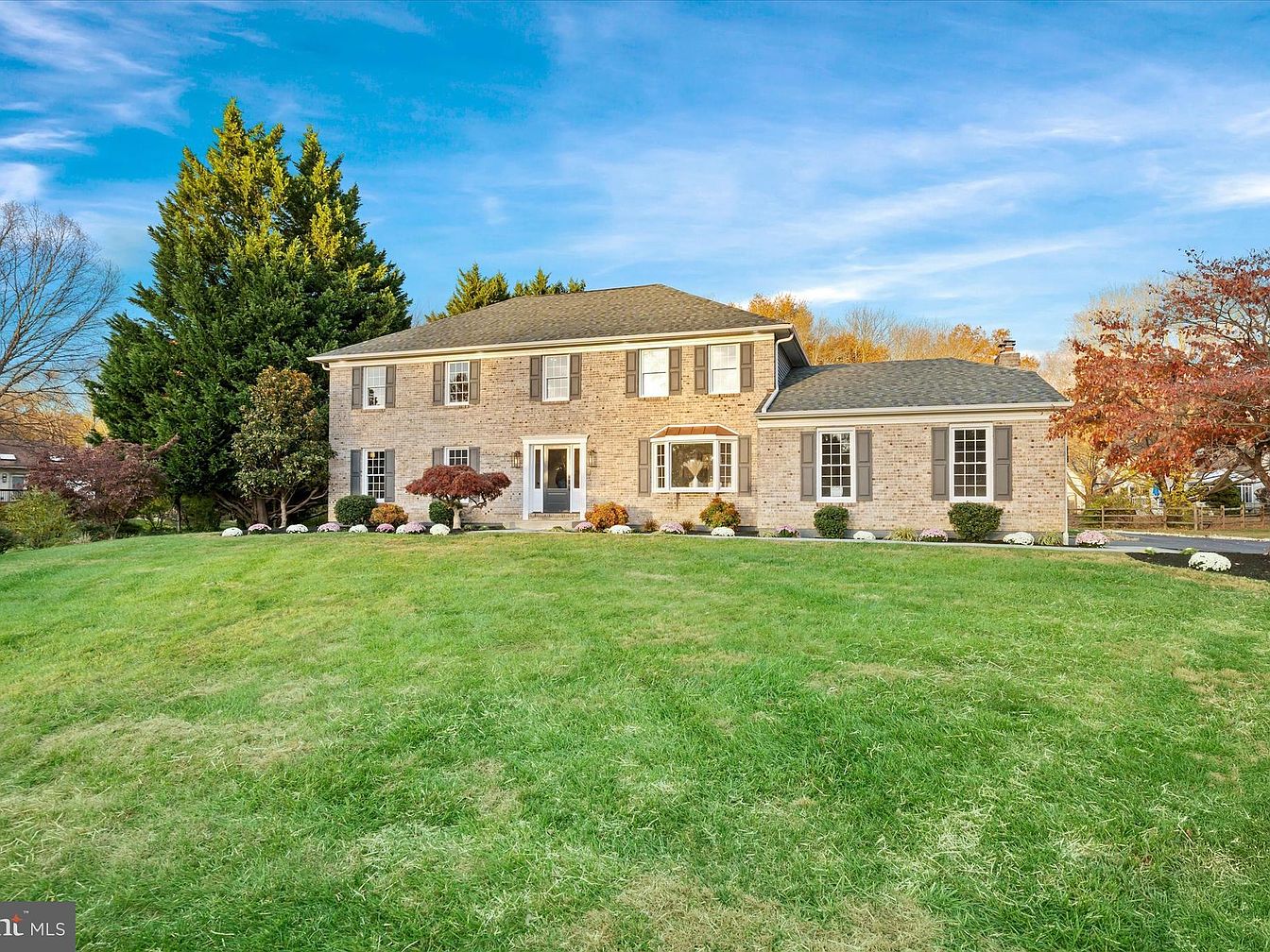 Grand 1987 Home in Hockessin, Delaware, Featuring Expansive 4815 sq. ft, a Custom Patio, and a Main Floor In-Law Suite