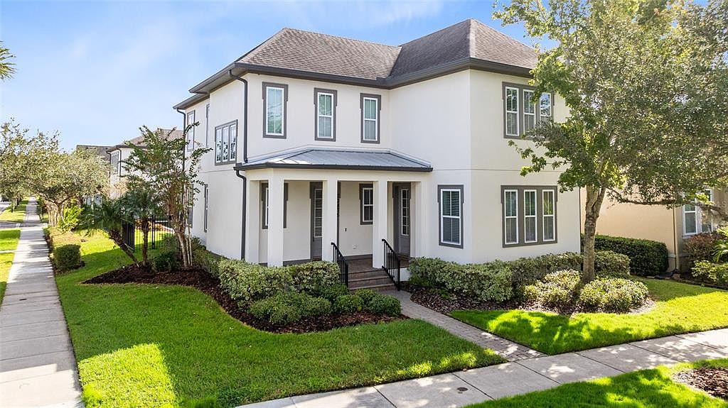 Experience Elegance in an Ashton Woods Home in Orlando, Florida, Featuring a Heated Pool and Detached Apartment