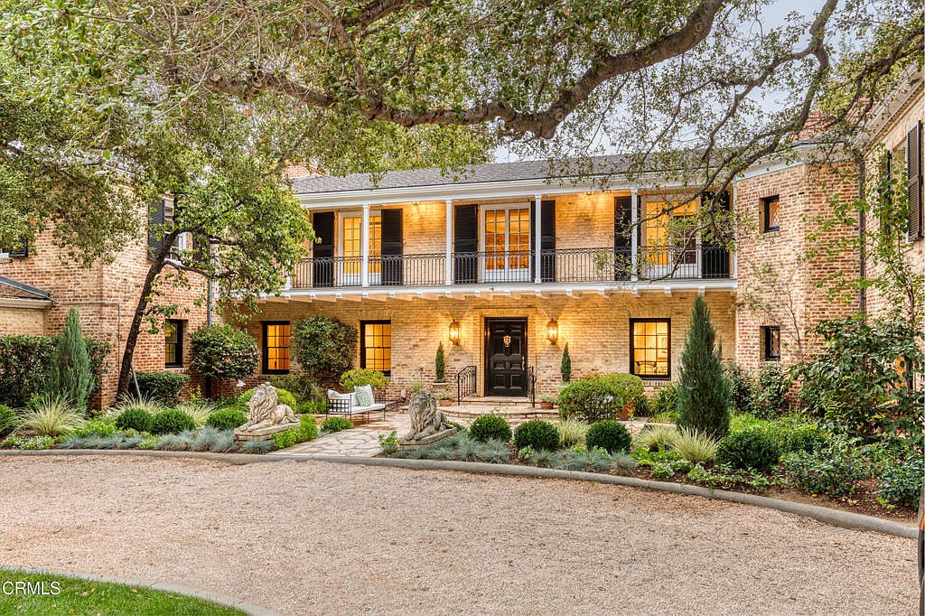 Discover the 1928 Monterey Colonial Masterpiece in Pasadena, California, with 18 Grand Rooms, 10 Fireplaces, and Lush 5 Acres