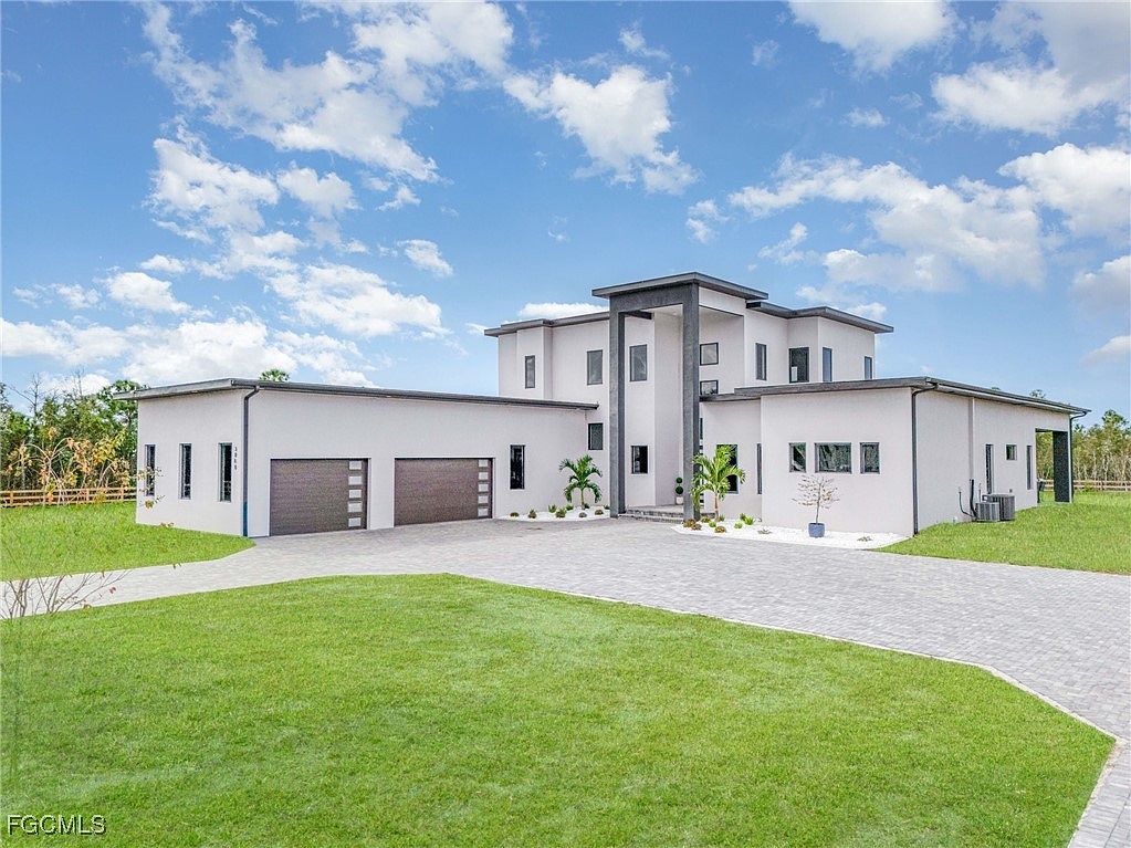 Experience a Luxury Estate in Cape Coral, Florida, Nestled on Over 2 Acres with Kitchen, Custom Finishes, and a Outdoor Oasis