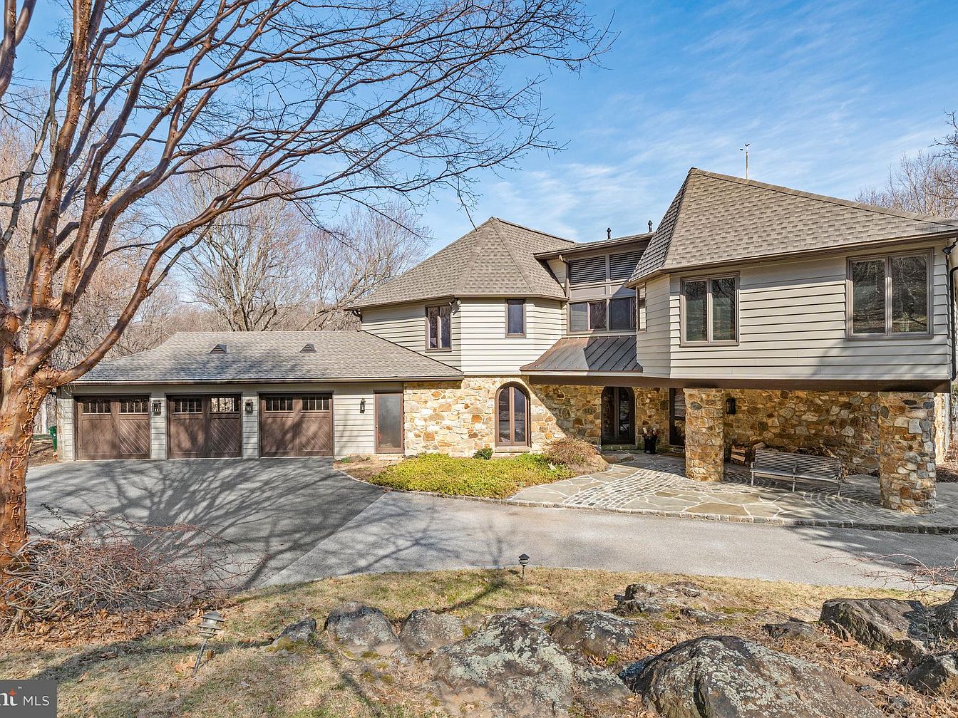 Luxurious 1979 Hilltop Estate in Wilmington, Delaware with Exquisite Stonework, a Grand Foyer, and 36.8 Acres of Serene Nature
