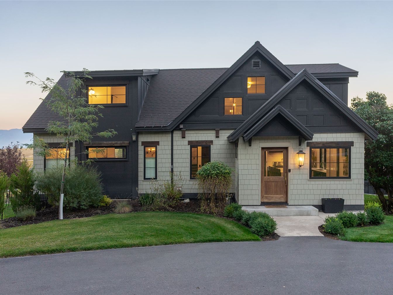 Stunning 1925 Estate in Kalispell, Montana, Boasting Over 5,000 Sq Ft, Expansive Decks with Mountain Views, and a Heated Shop