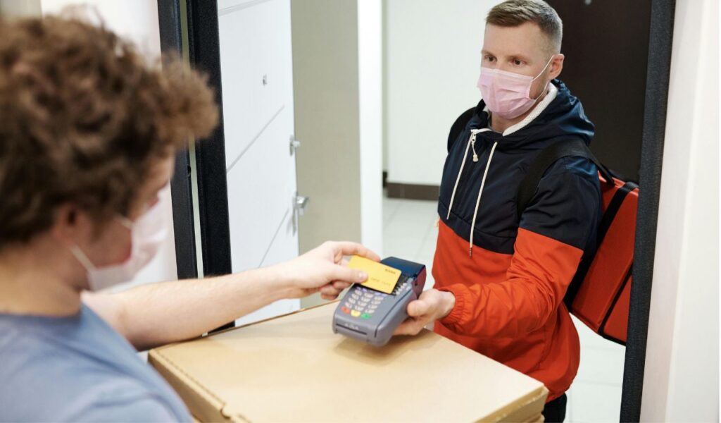 Giving Payment to Delivery Man