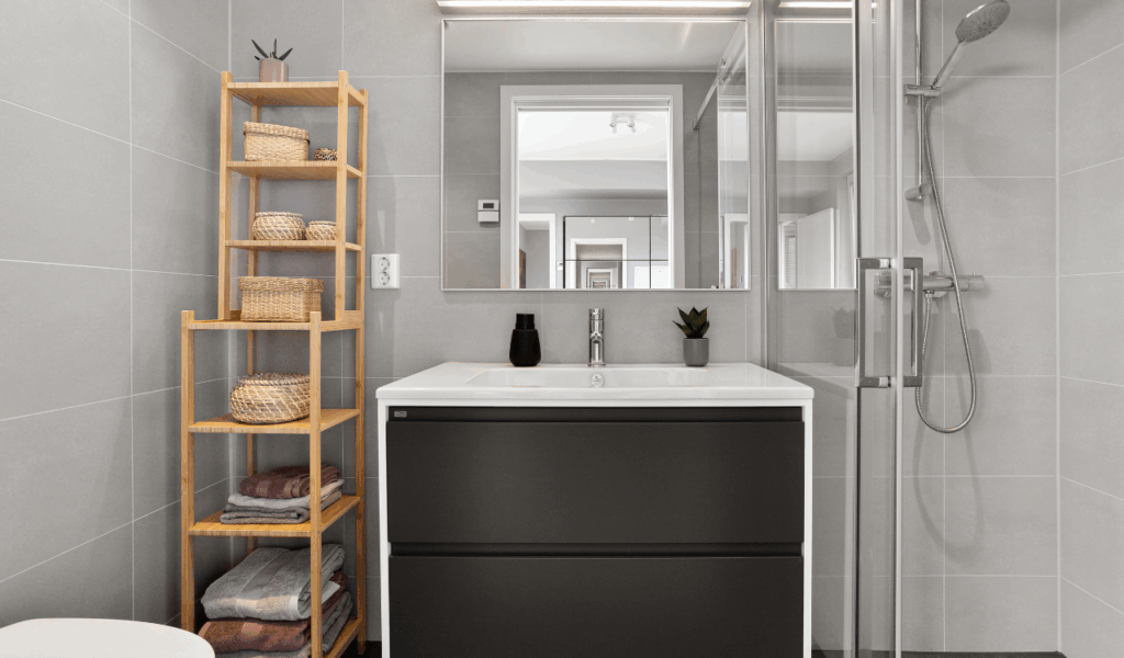 9 Over-the-Toilet Storage Units That Scream “Tiny Bathroom Panic”