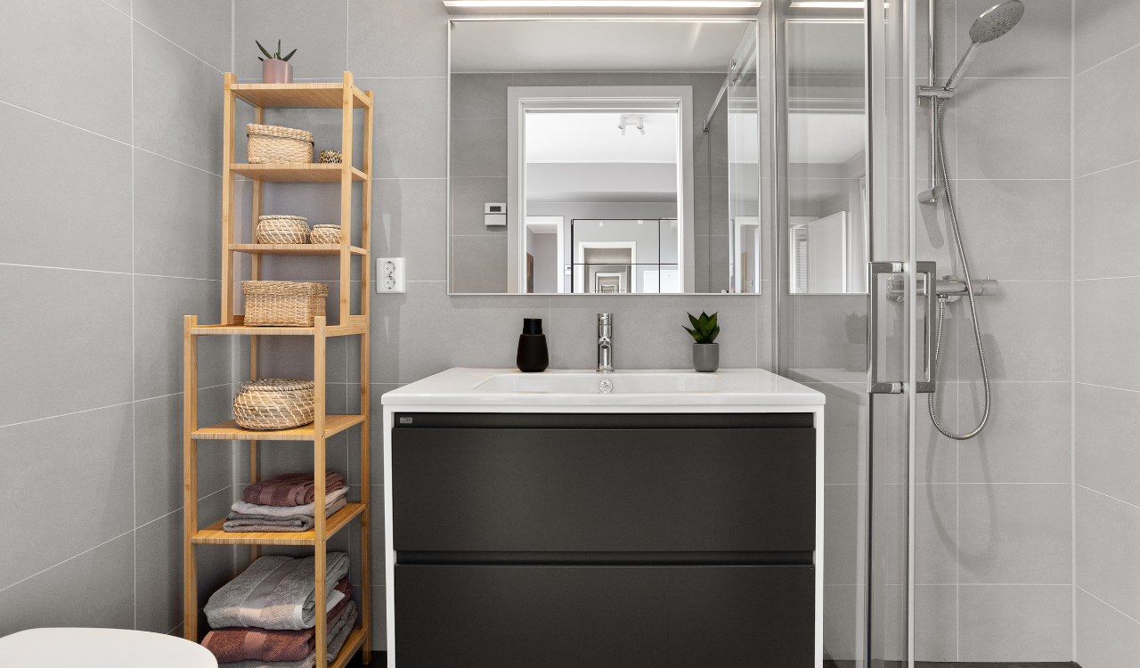 9 Over-the-Toilet Storage Units That Scream “Tiny Bathroom Panic”