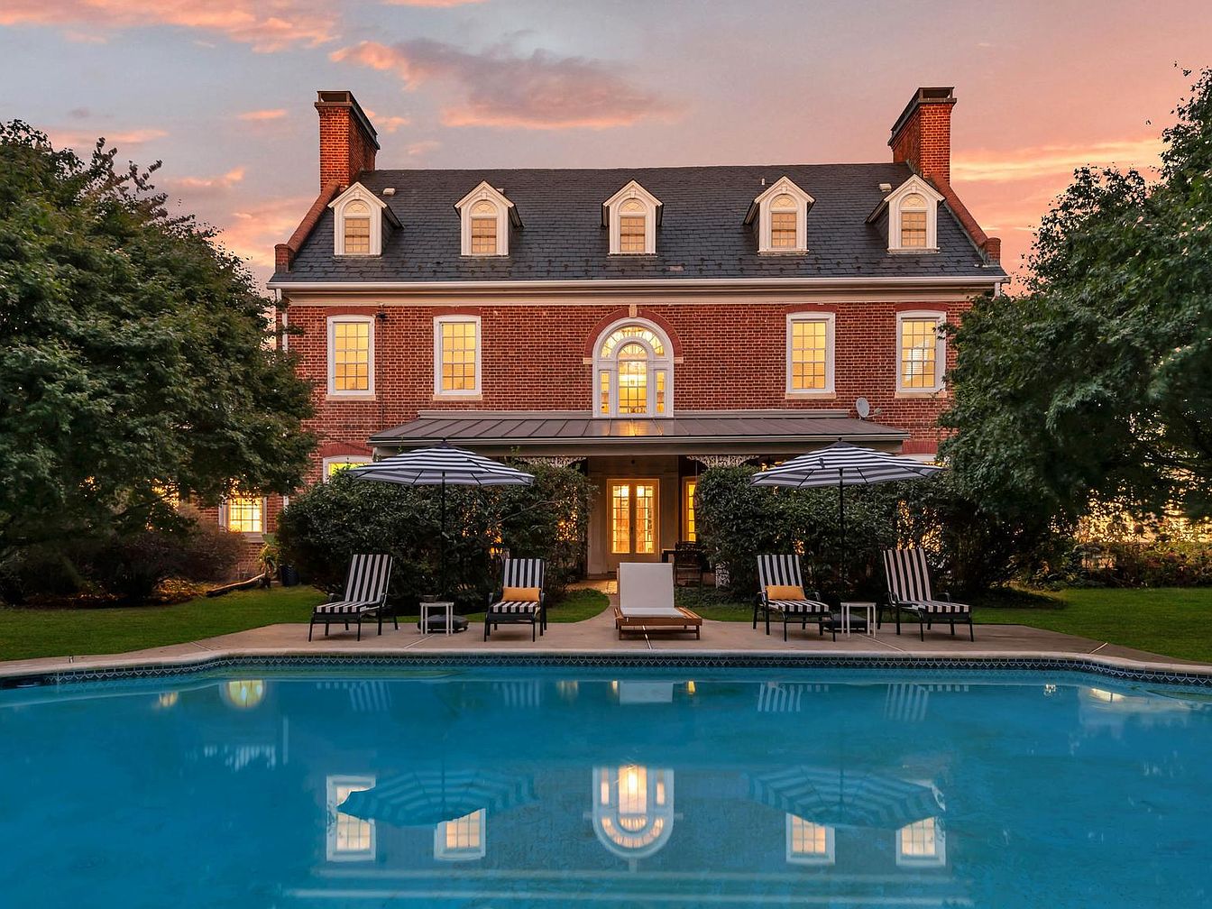 Amazing 1912 Architectural Jewel in Pikesville, Maryland, Featuring Exquisite Crown Moldings, Six Fireplaces, and a Sunroom