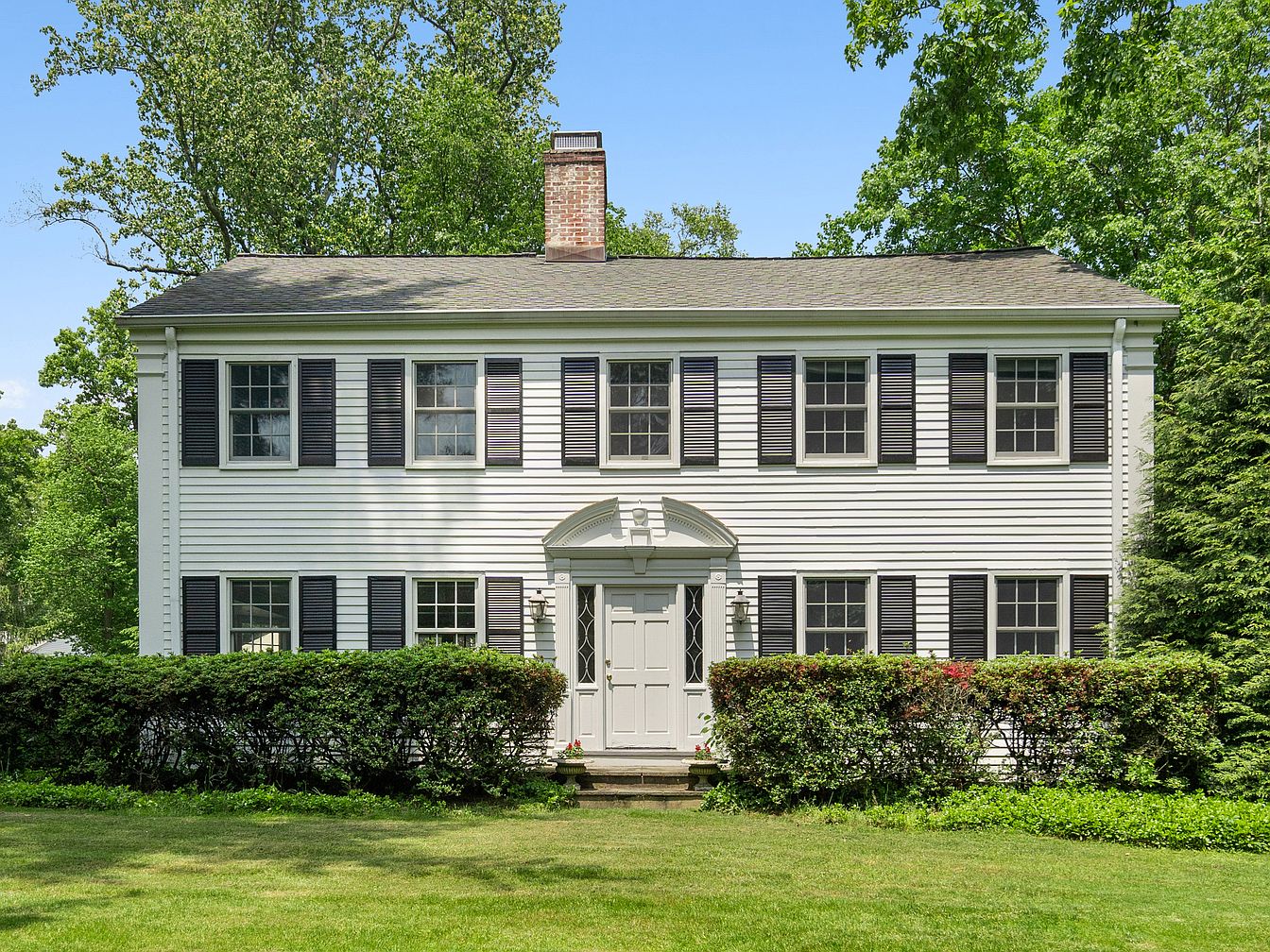 Timeless 1942 Colonial in Norwalk, Connecticut, Featuring Expansive 1.21 Acres, 1940s Details, and a Wood-Burning Fireplace