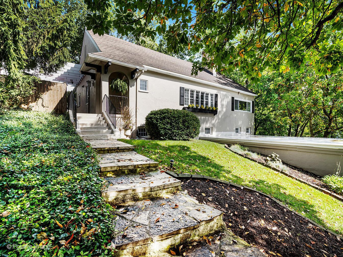 Charming 1927 Storybook Cottage in Hinsdale, Illinois, Featuring a Magical Living Room with a Floor-to-Ceiling Fireplace