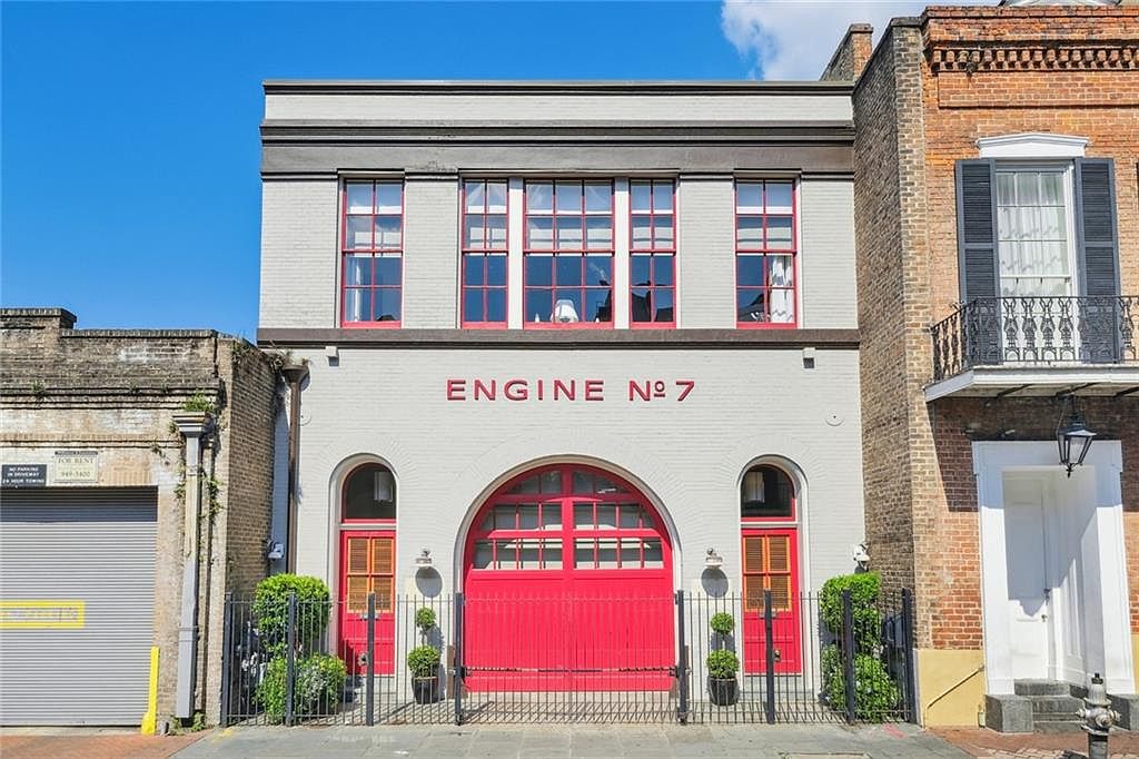 Luxurious 1905 French Quarter Firehouse in New Orleans, Featuring Exposed Brick, Custom Lighting, and a Heated Saltwater Pool