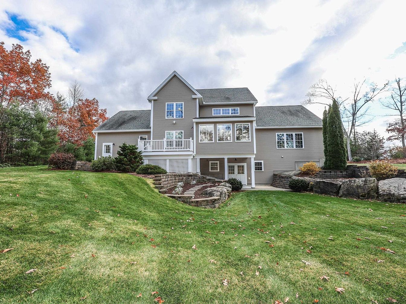 Discover a Haven in Merrimack, New Hampshire, Featuring Four Bedrooms, a Sunroom, and Solar Panels on a 2.50-Acre Lot