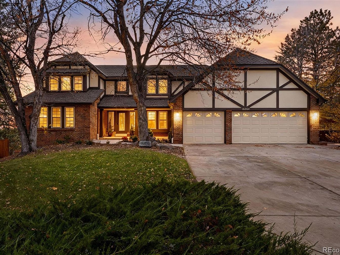Stunning 1984 Mountain Home in Centennial, Colorado, Featuring a Designer Kitchen, Luxurious Bathrooms, and a Backyard Retreat